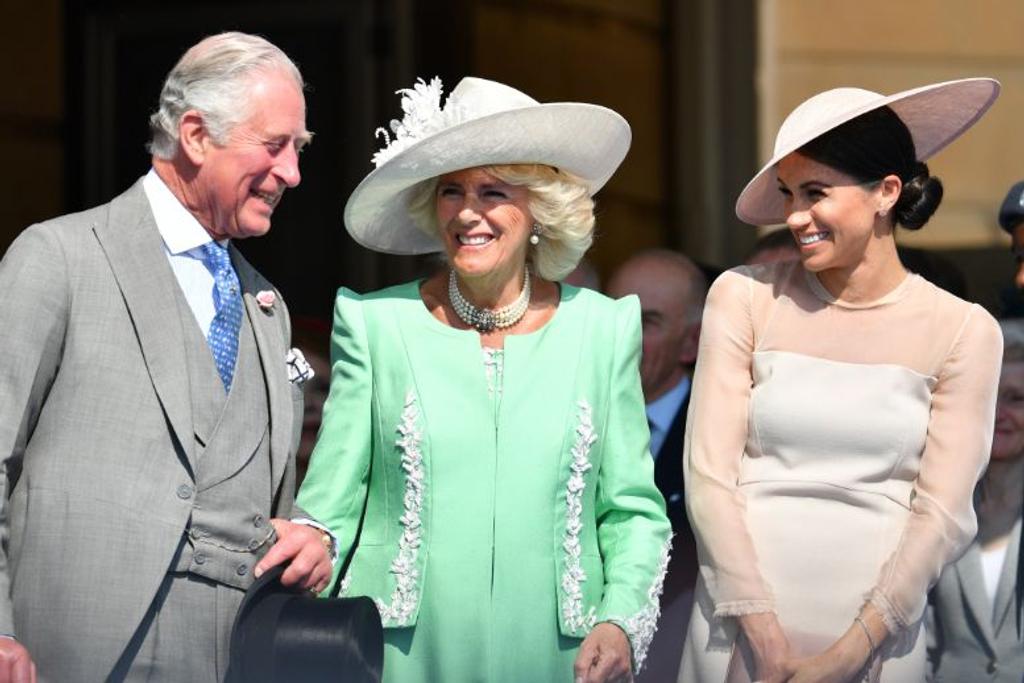 Prince Charles of Wales, Camilla Duchess of Cornwall, and Meghan Markle Duchess of Sussex